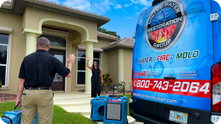 United-water-restoration-technician-greets-customer